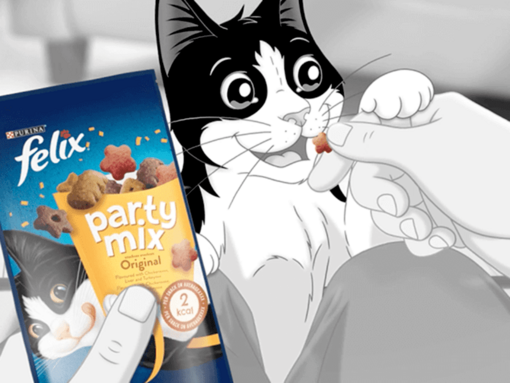 Felix being fed Party Mix treat